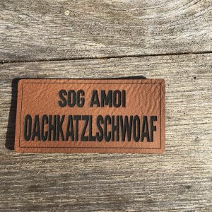 Lederlabel "Sog amoi Oachkatzlschwoaf"
