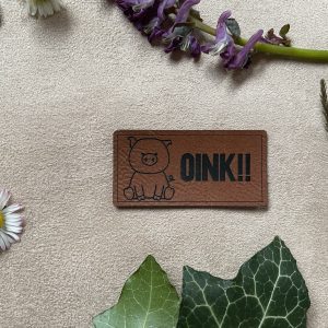 Kunstlederlabel "Oink"