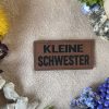 Lederlabel kleine Schwester
