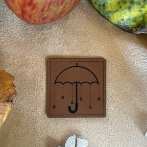 Lederlabel "Regenschirm"