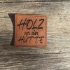 Lederlabel holz vor der Hütte