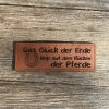 Lederlabel Pferd Glück auf dem Rücken der Pferde
