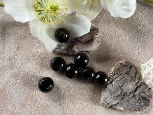 große Perle schwarz