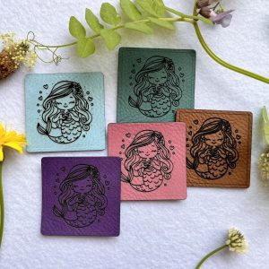 Lederlabel mit Motiv Meerjungfrau
